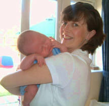 Suzanne with newborn James